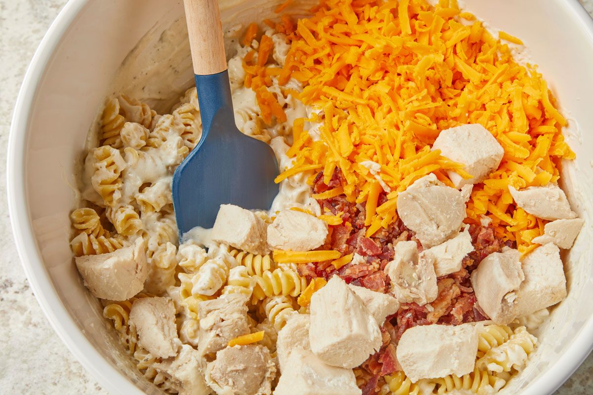 Stir in chicken, bacon and 1 cup Colby cheese.