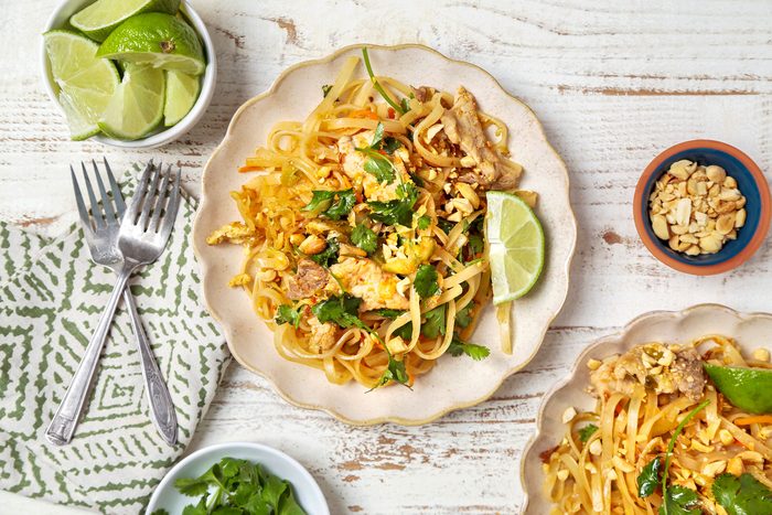 Two servings of Easy Pad Thai, the dish is arranged in white bowls