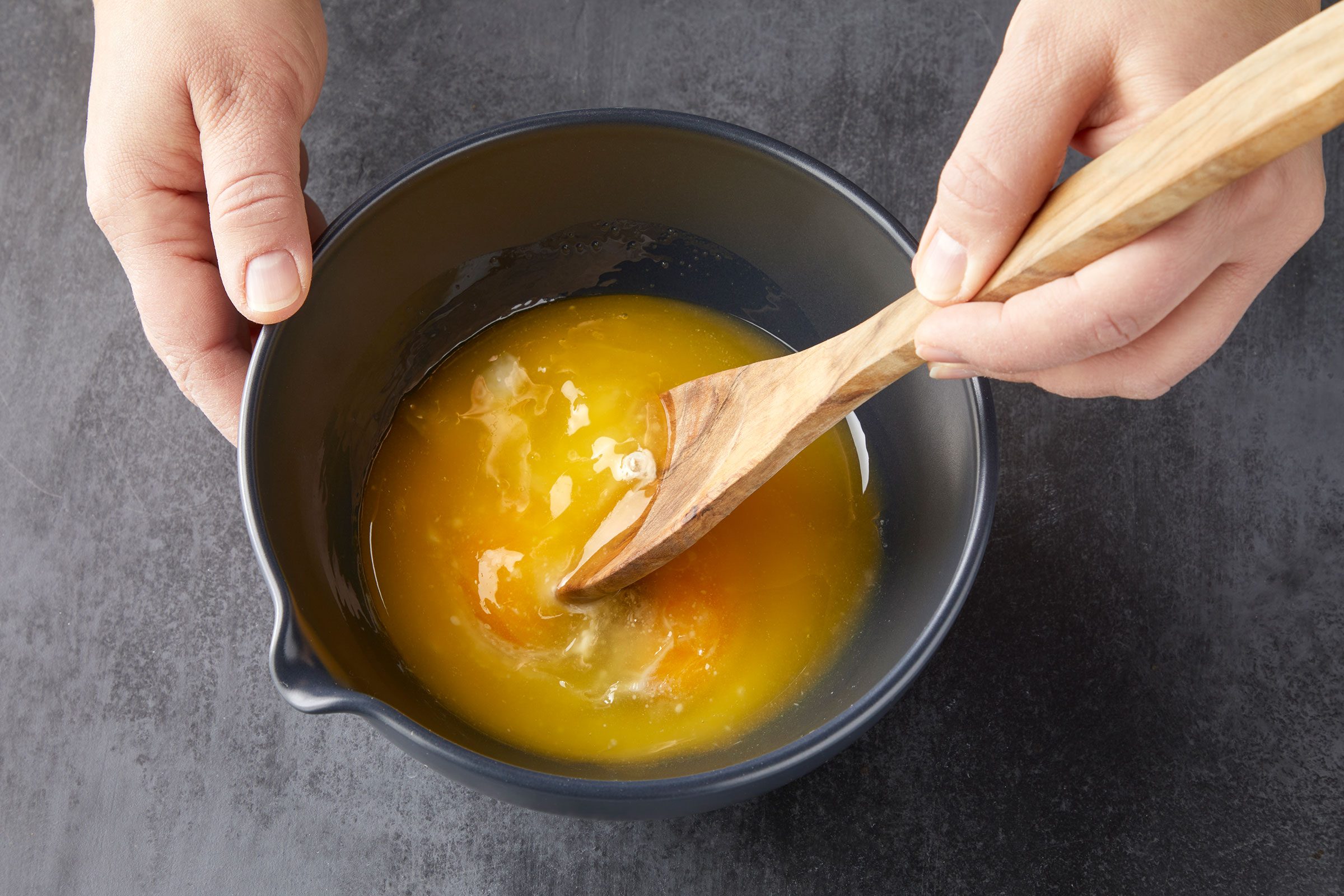 Eggs, butter, lemon zest and extract mixed in a small bowl