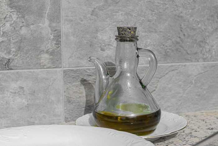 Oil can on top of marble