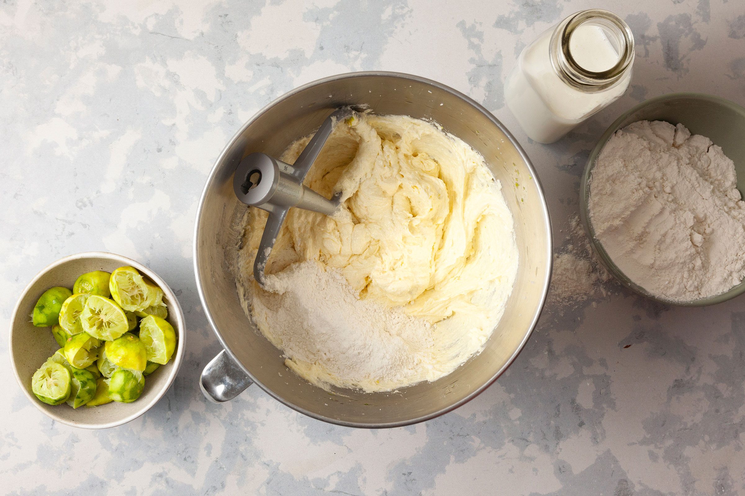 Creamed sugar, butter and oil in a large bowl