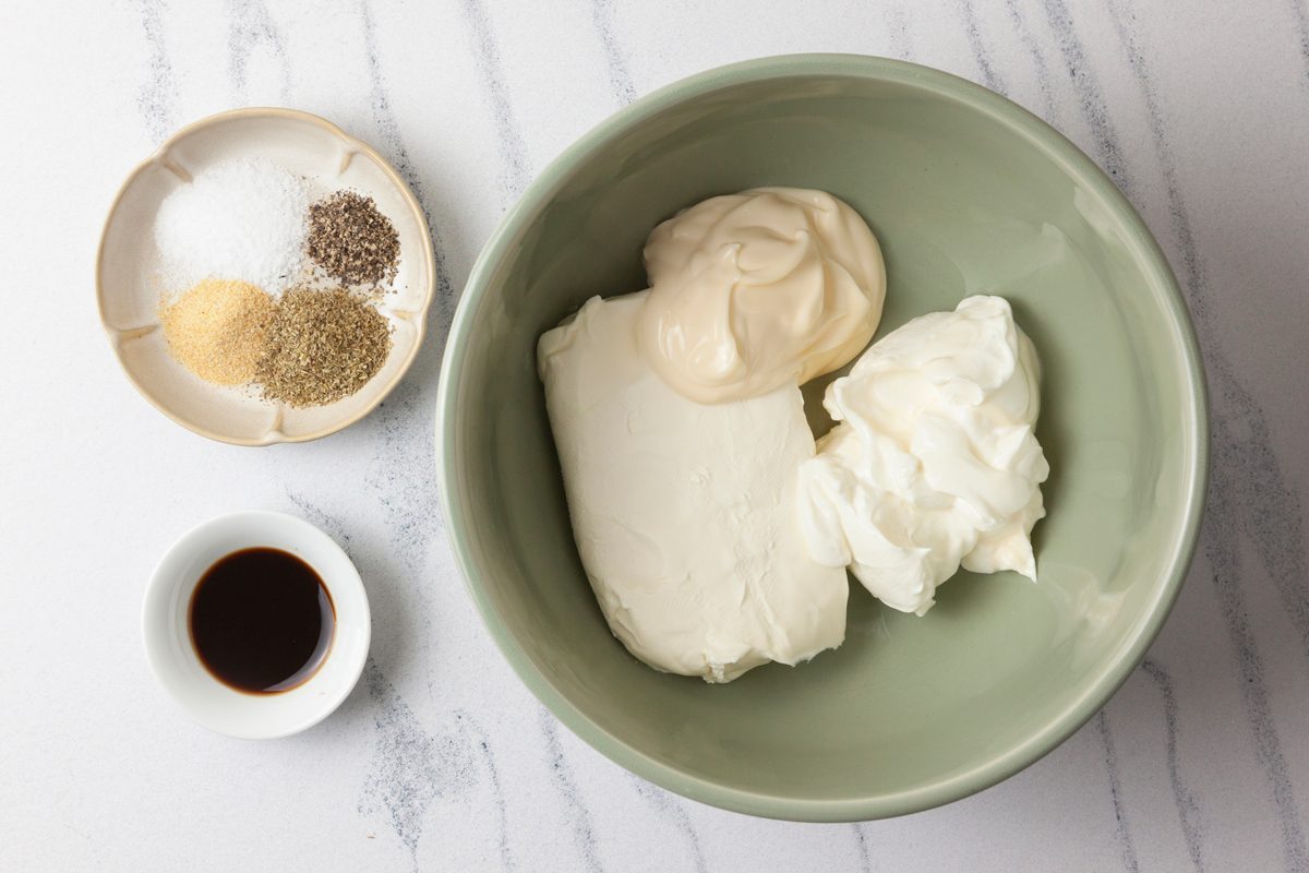 Combine the cream cheese, sour cream, and mayonnaise in a large bowl