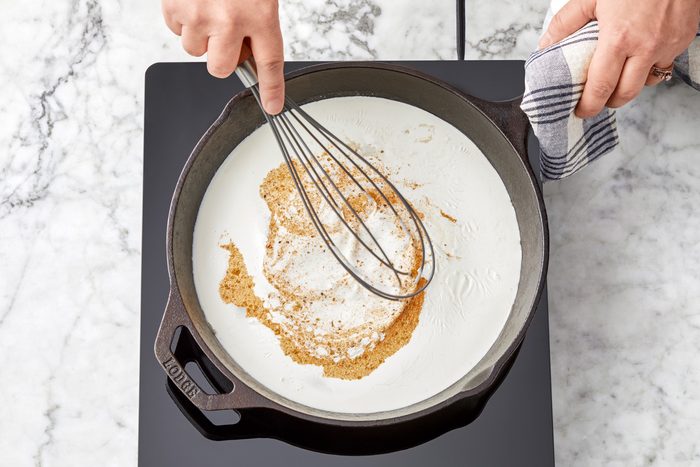 In cast iron skillet, heat butter, stir in flour