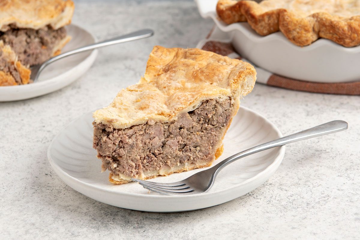close up shot of Slice of Tourtiere French Canadian Meat Pie