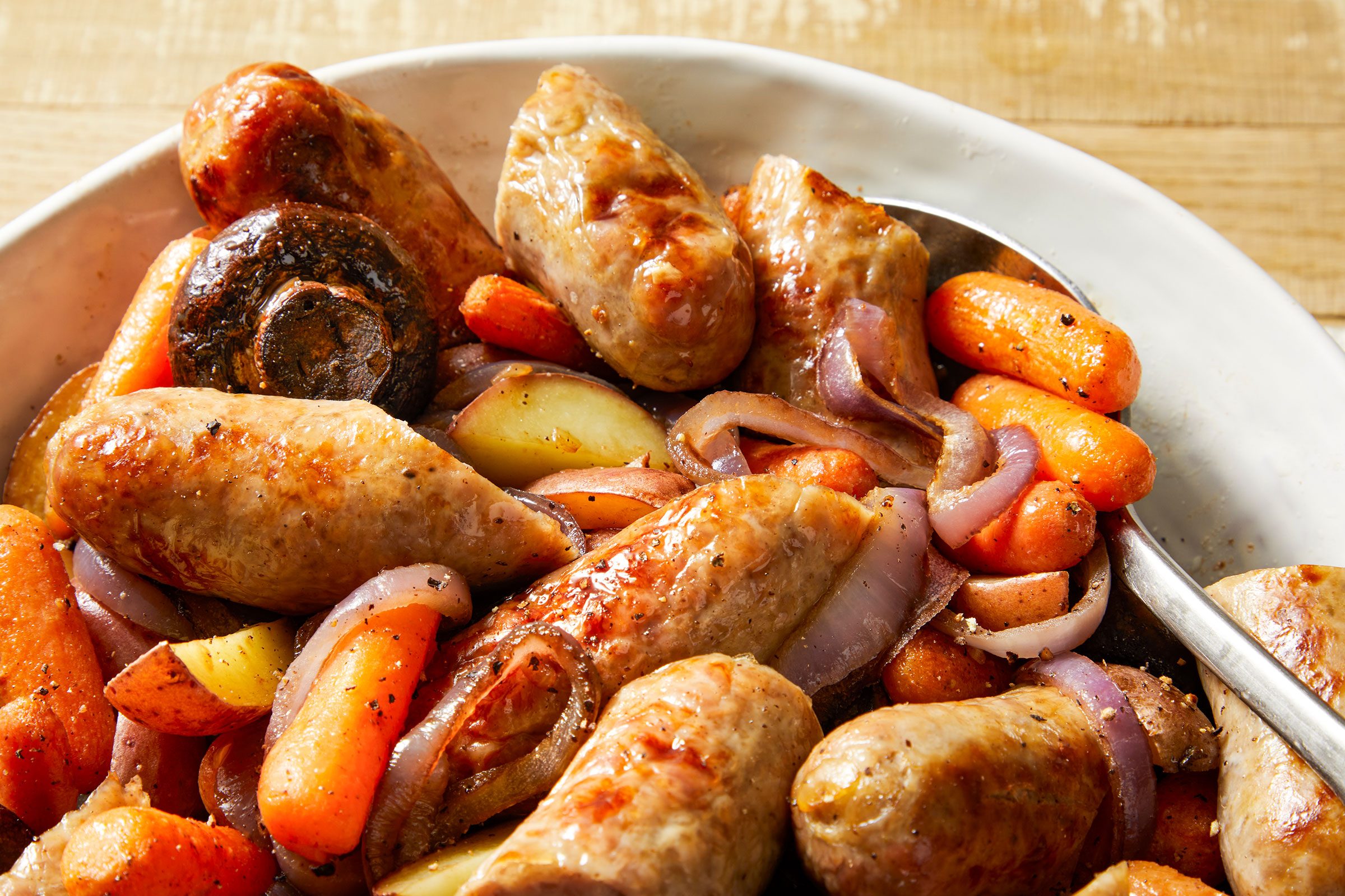 Bratwurst Supper in a large white bowl