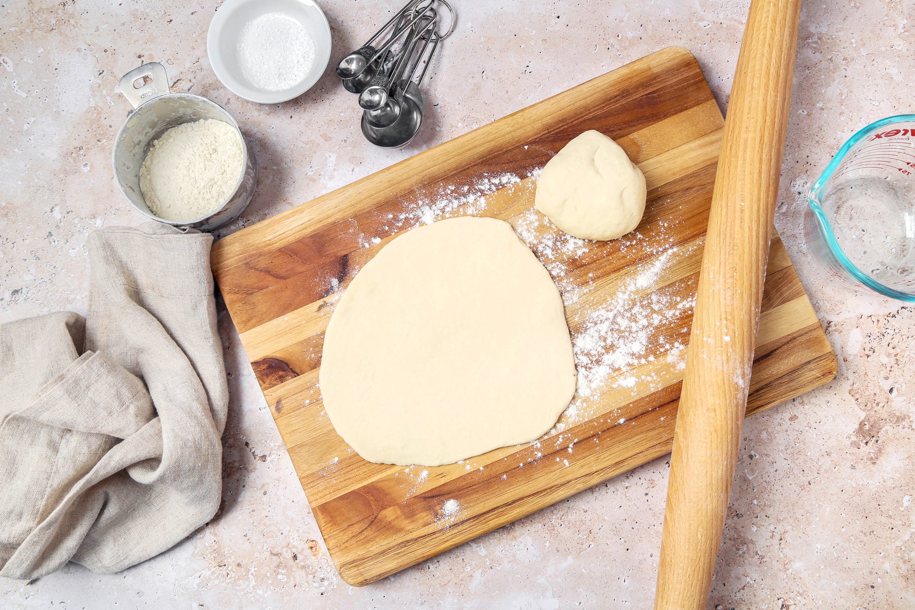 Dough rolled out on a lightly floured work surface