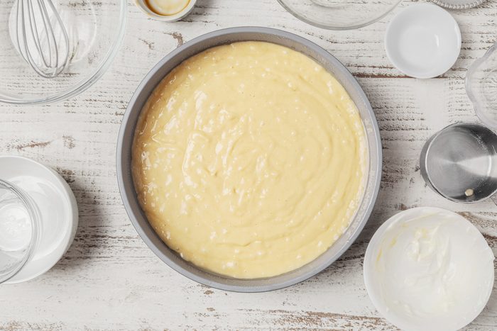 batter poured into a greased 9-inch round baking pan