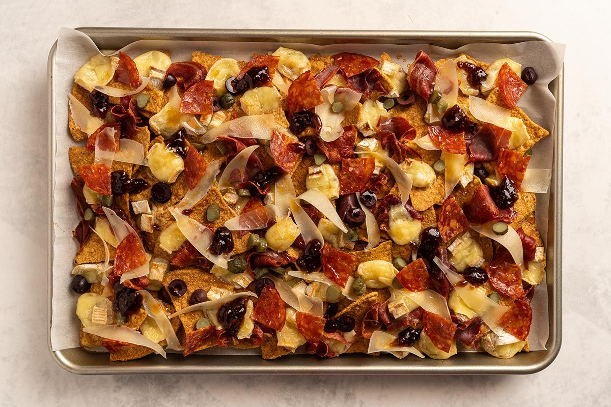 Charcuterie Nachos on a baking sheet