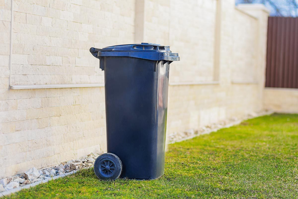 Garbage tank near the house