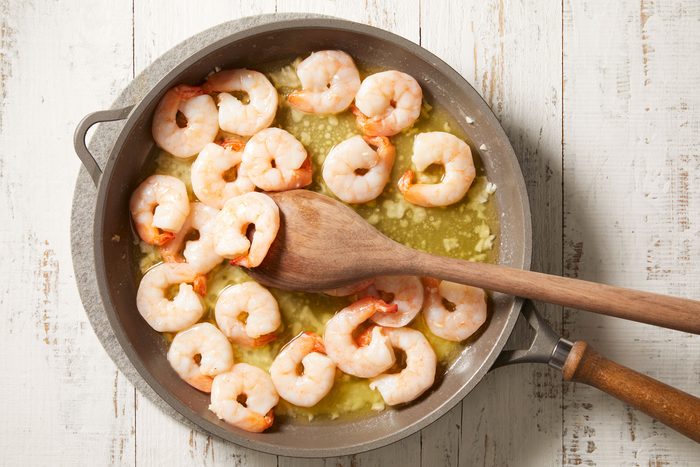 saute shrimp and garlic in butter until shrimp turn pink.