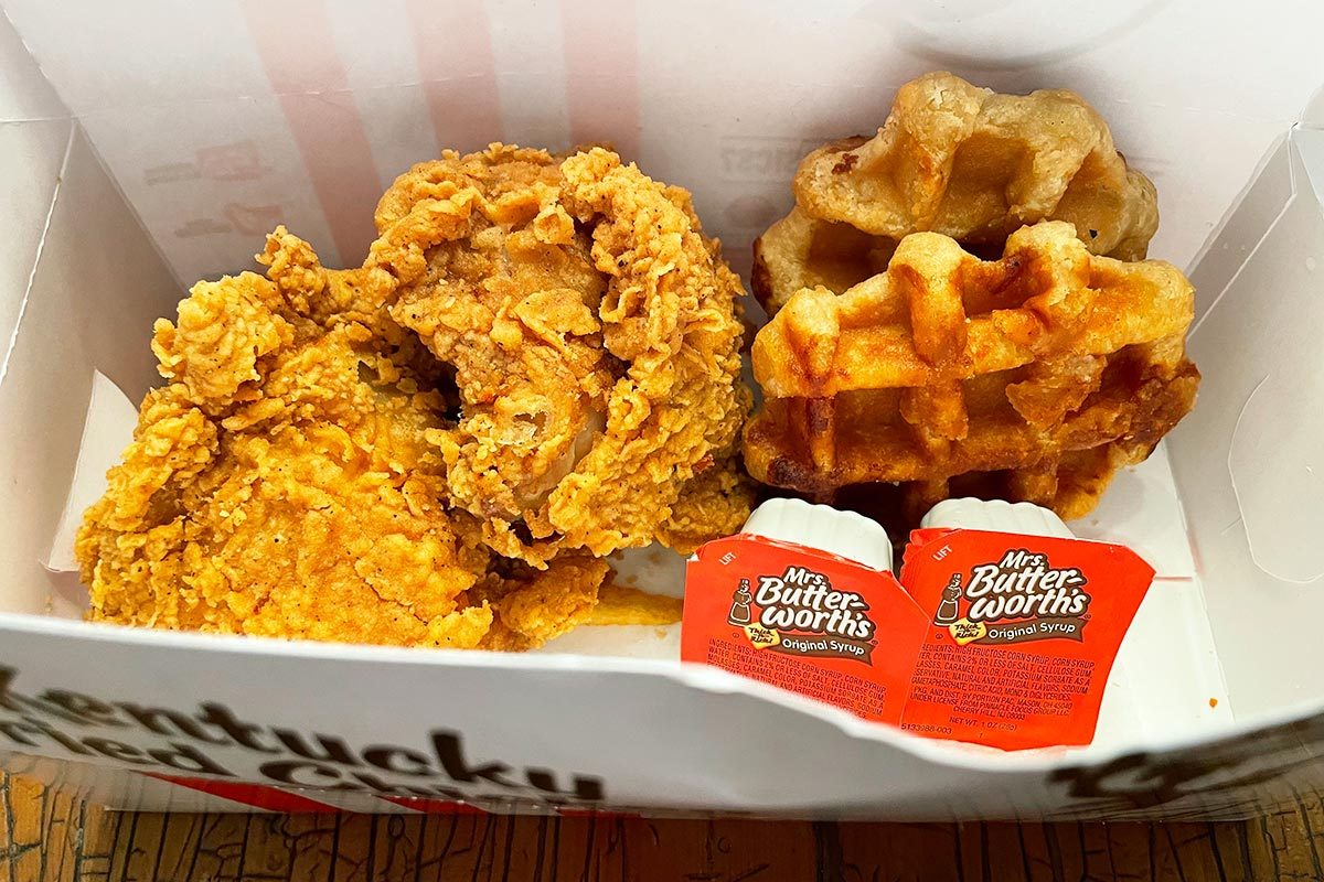 KFC chicken and waffles box with Mrs. Butterworth's syrup packets