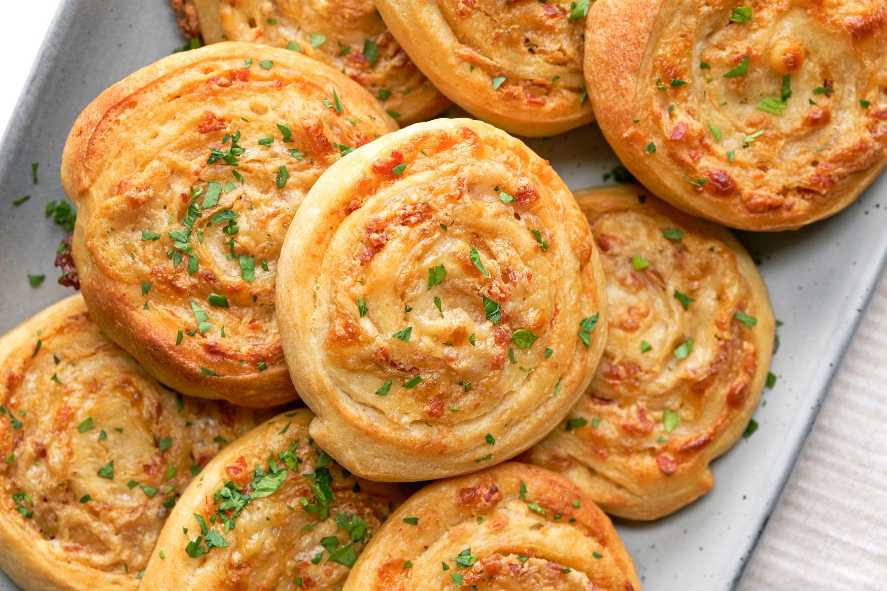 Baked Pinwheels is ready and served in a tray
