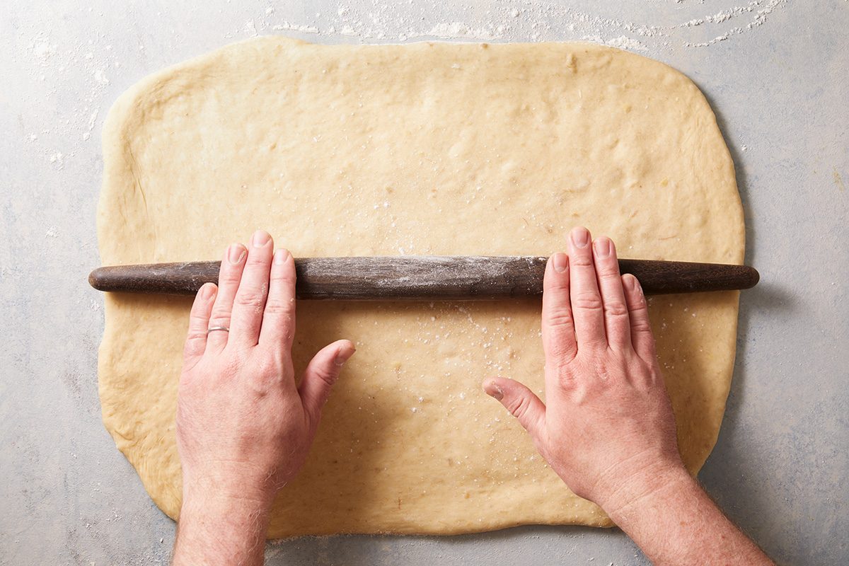 Punch down dough. On a lightly floured surface, roll dough into an 18x12-in. rectangle