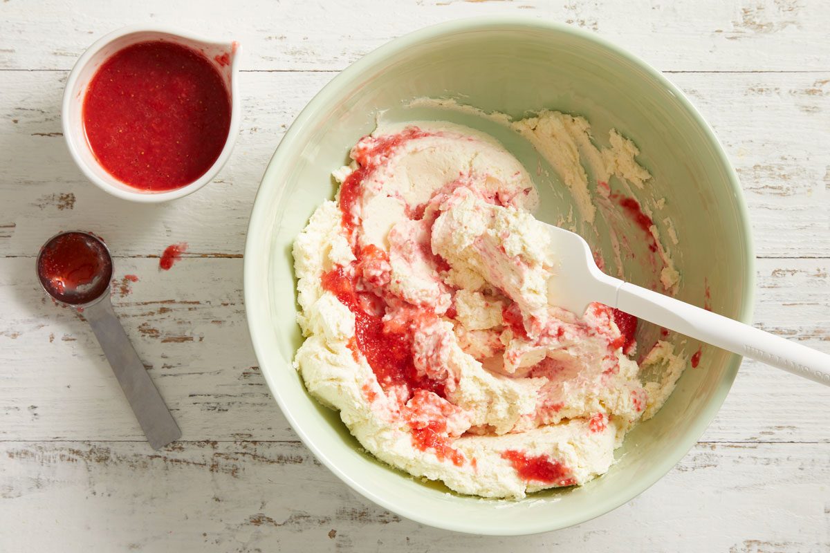 Add strawberry puree to cream cheese mixture;