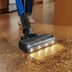 This Bissell Stick Vacuum Has Headlights So You Don't Miss Any Mess