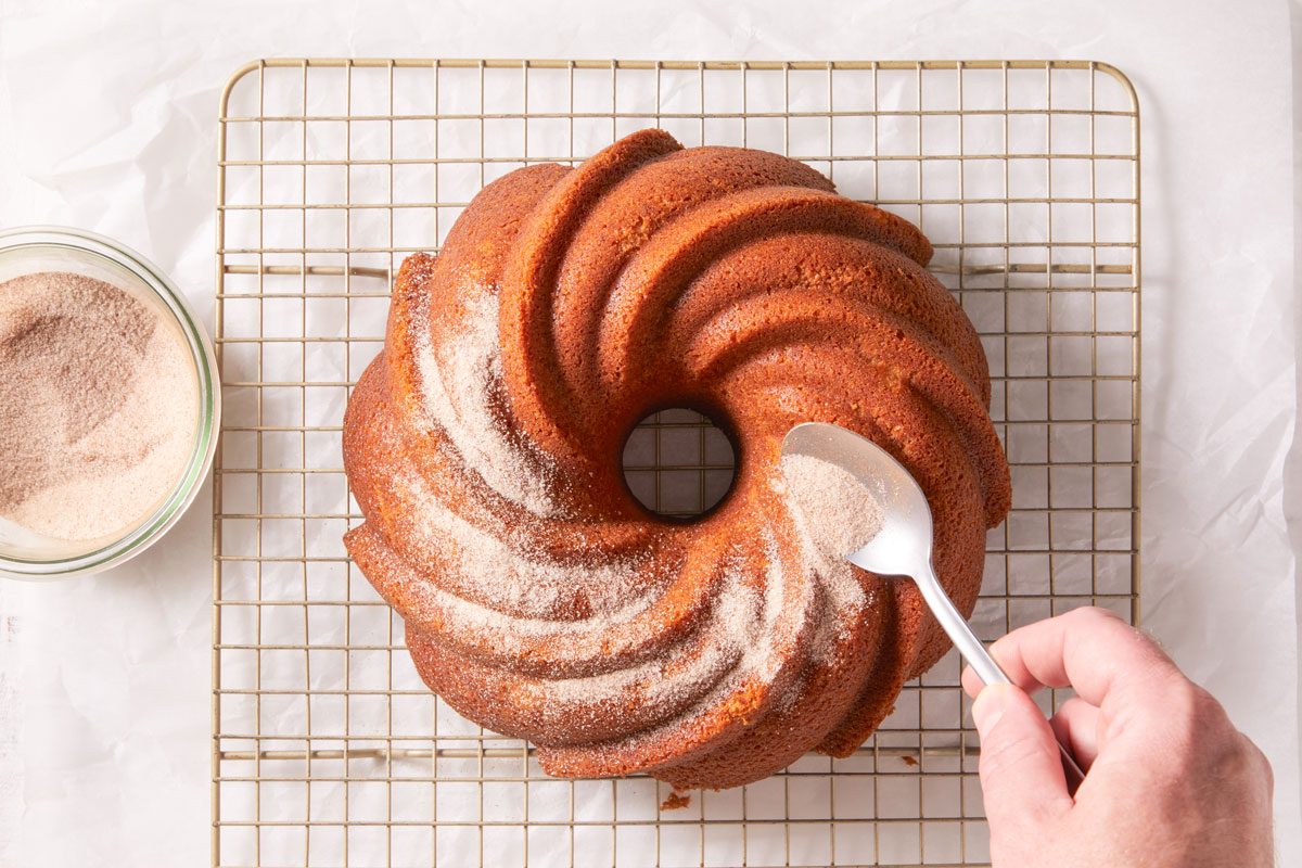 Sprinkle sugar and cinnamon mixture over warm cake,