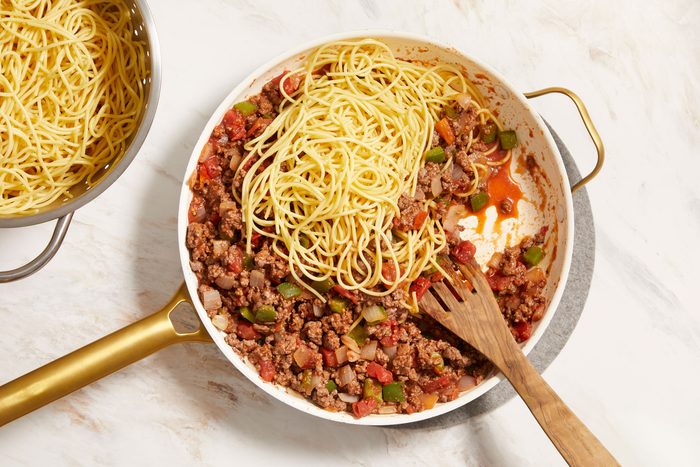 Drain spaghetti; add to beef mixture.
