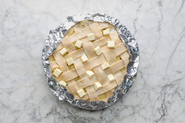 edges of pie covered with foil