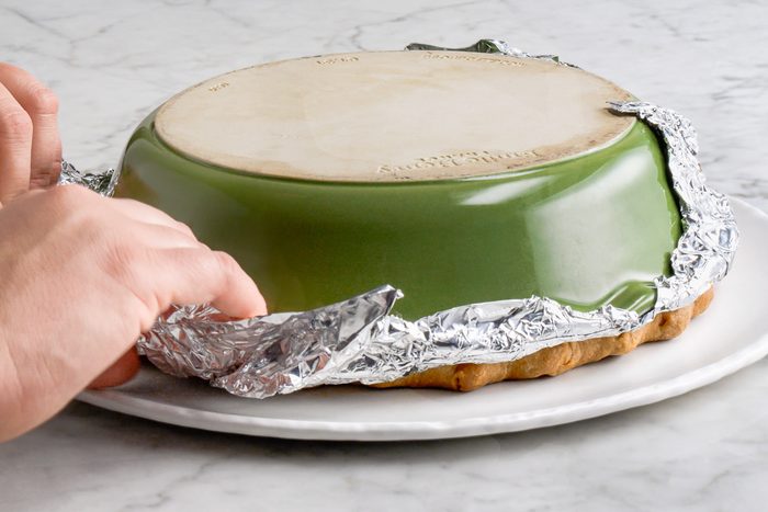 flipping pie onto a plate