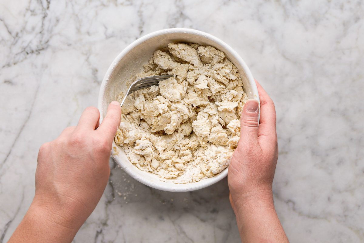 mixing flour, salt, shortening and butter with a fork