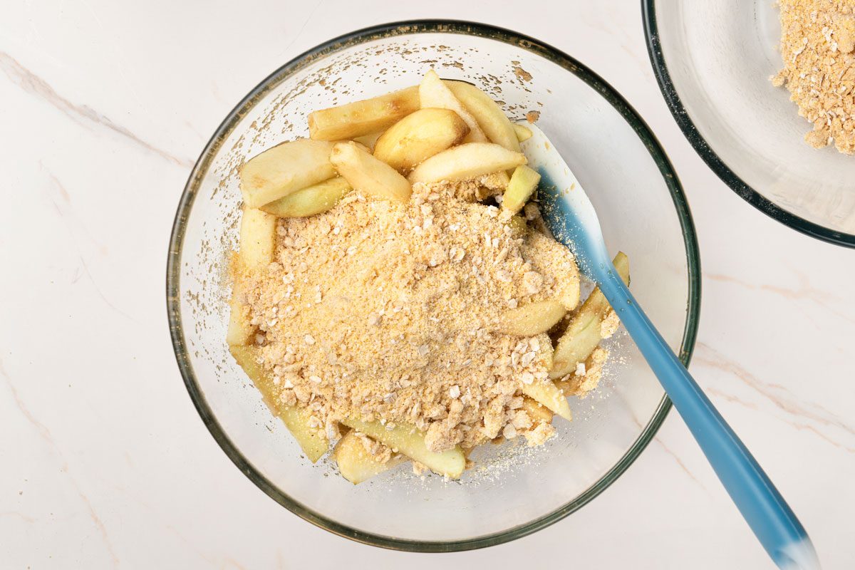 Add 1/2 cup cornbread mixture to apples.