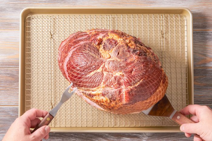 Place ham on a rack in a shallow roasting pan