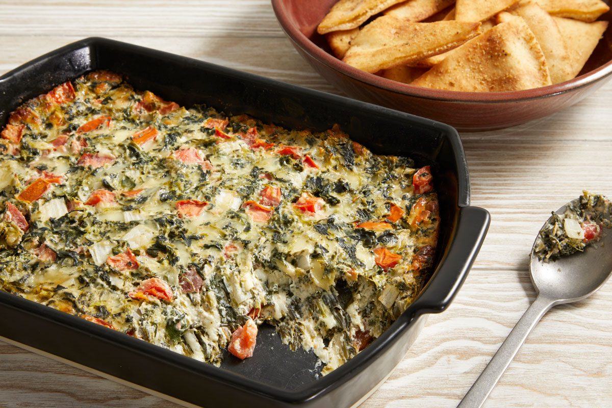 3/4 shot of Hot Spinach Spread with Pita Chips