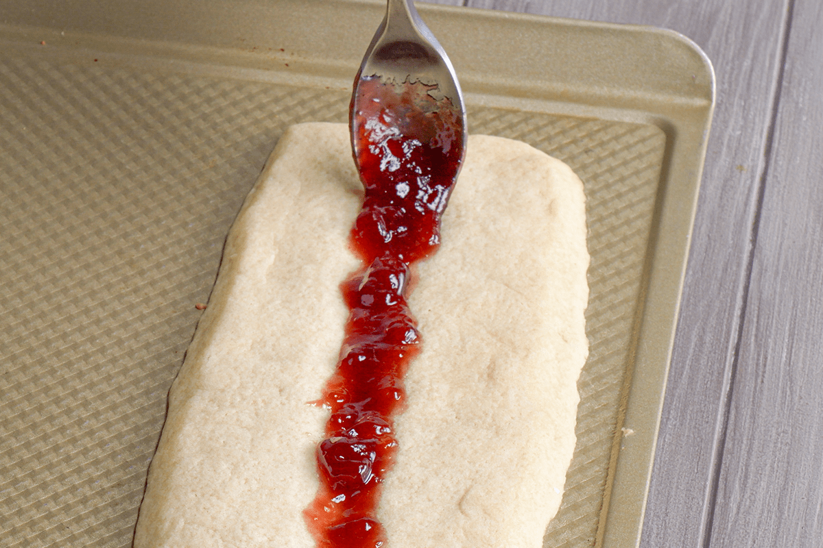 Adding jam to cookie dough