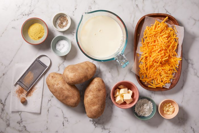 butter, flour, soy milk, cheddar cheese, yeast, thyme, potatoes, pepper and nutmeg