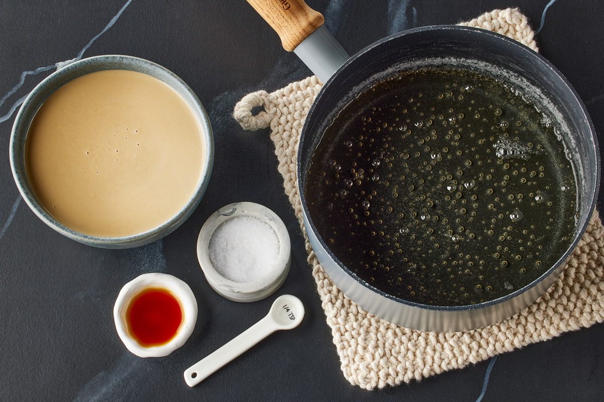 sugar and water being cooked in a saucepan next to sauce and tahini