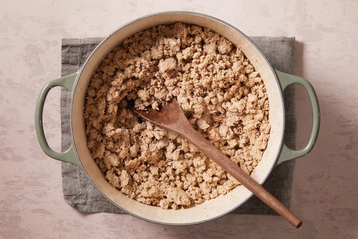 ground turkey being cooked in a large stockpot